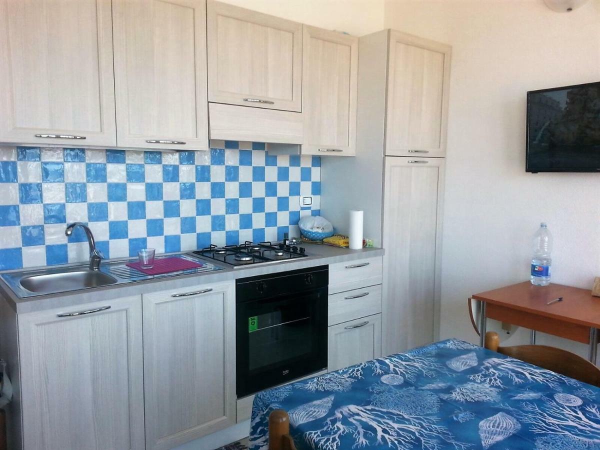 Fronte Mare Bella Vista Apartment Isola Rossa Bagian luar foto